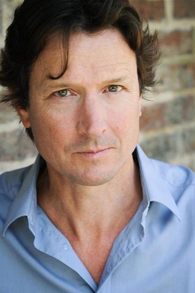 Том Бачер
